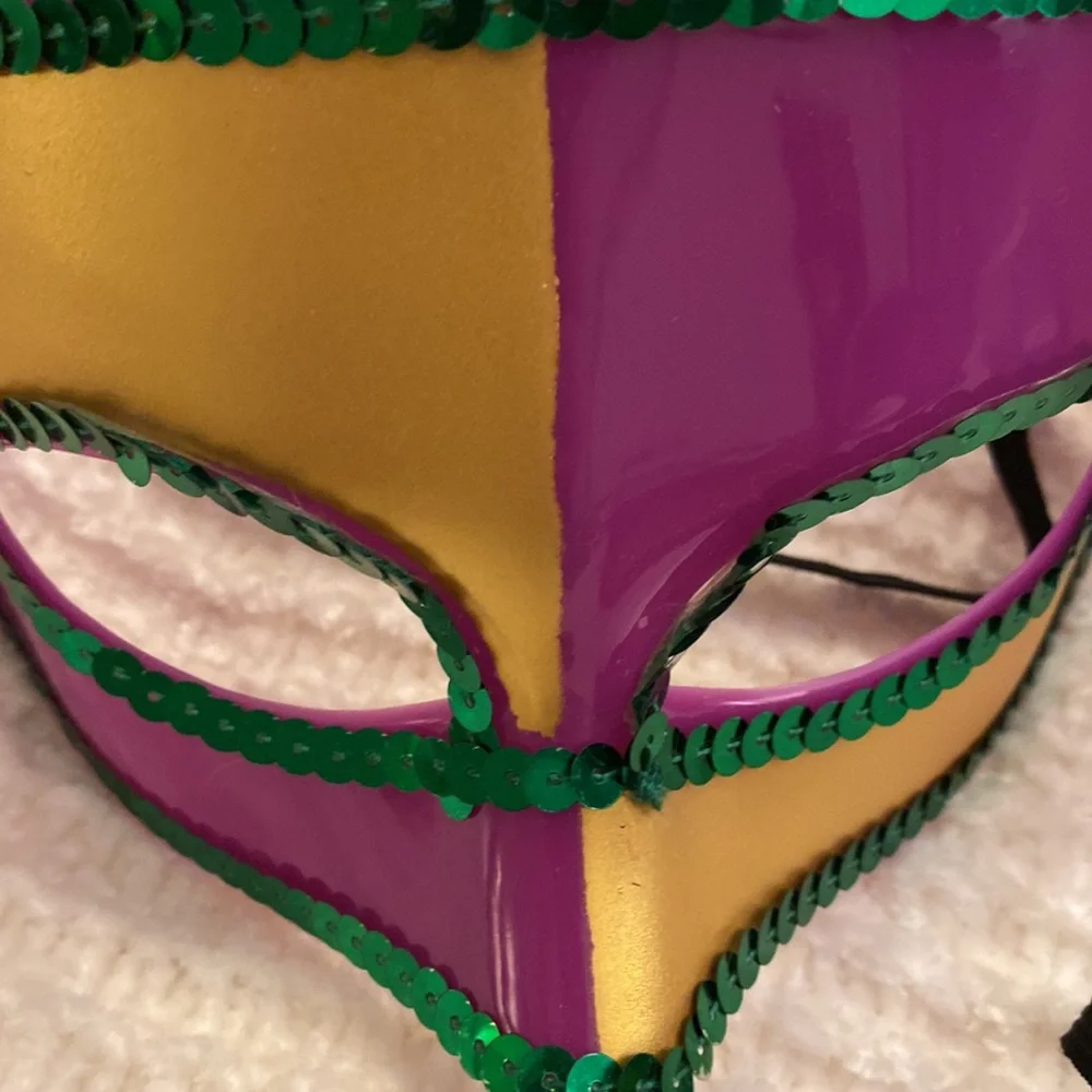 Set of 7 Mardi Gras Masks! Hard plastic purple masks. Very hearty and will last!